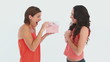 Girl gives friend a present