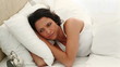 Woman staying in bed