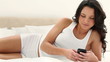 Video: Brunette haired woman reading a text message Brunette haired woman reading a text message