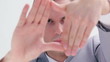 Serious man making a hand gesture