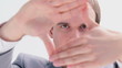 Serious businessman joining his hands