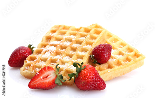 Photo: belgium waffles with strawberries isolated on white belgium waffles with strawberries isolated on white