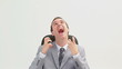 Businessman sitting making facial expressions