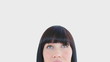 Brunette woman is smiling at the camera