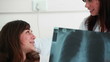 Patient looking at an x-ray scan
