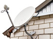 Satellite dish antenna on house