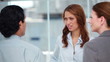 Businesswoman having a discussion with her colleagues