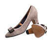 Pair of suede female shoes over white Pair of suede female shoes over white