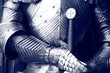 Ancient metal armor in sepia.