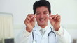 Doctor breaking a cigarette