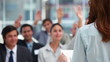 Business people with the hands raised