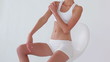 Woman touching her body