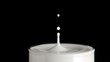 Drop of milk falling in super slow motion