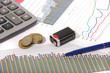 graphics with pen and battery and coins graphics with pen and battery and coins