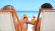 Couple holding cocktail 