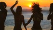 Young woman dancing on the beach