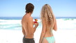 Couple holding cocktails