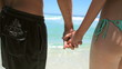 Couple holding each other hand