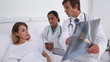 Doctor showing to a patient her chest x-ray