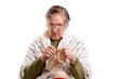 old woman knits