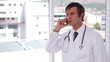 Doctor calling with a mobile phone