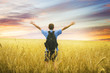 Man in yellow wheat meadow.