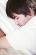 Photo: Mid adult man sleeping, close-up Mid adult man sleeping, close-up