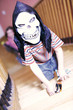 Boy wearing skull mask