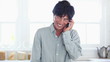 Man happily using a mobile phone