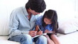Video: Father watching his daughter colouring Father watching his daughter colouring