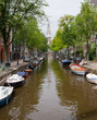 Amsterdam Canal and Church Portrait Amsterdam Canal and Church Portrait