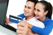 happy couple shopping online