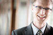 Businessman smiling, portrait