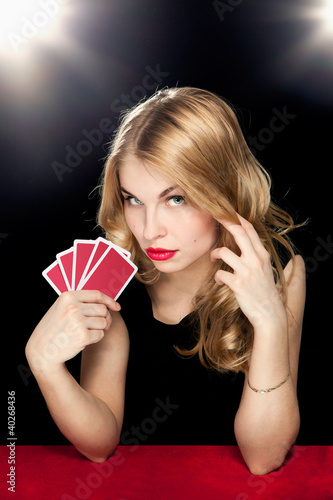 Photo: young girl playing in the gambling young girl playing in the gambling