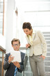 Business people holding document