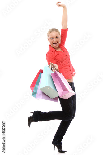 Photo: Happy woman with colorful shopping bags Happy woman with colorful shopping bags