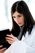 Young woman reading book