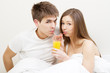Young couple drinking juice