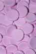 effervescent pink pills isolated and disordered