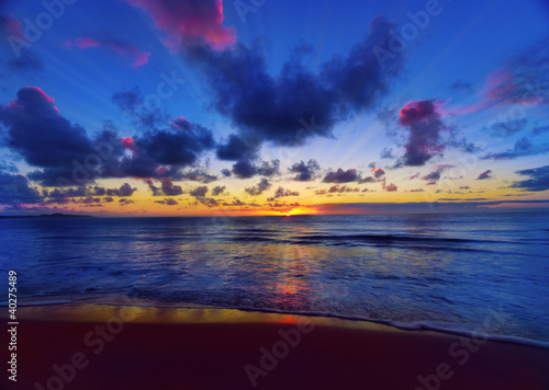 Photo: beautiful sunset on the beach beautiful sunset on the beach