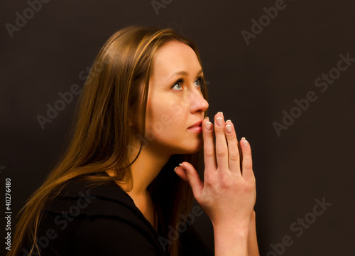 Photo: woman praying woman praying