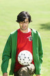 Young man playing Keepy Uppy