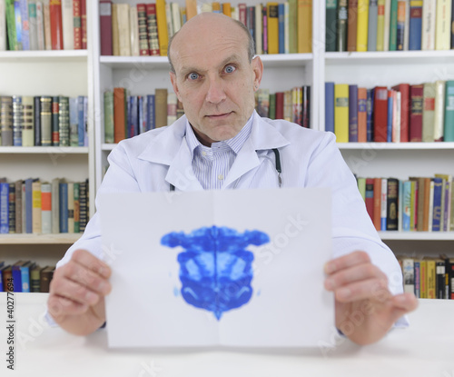 Photo: Psychotherapist holding Rorschach Test Psychotherapist holding Rorschach Test