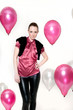 Photo: frau in pink mit vielen schwebenden luftballons frau in pink mit vielen schwebenden luftballons