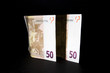 dinero que sale a la luz