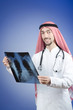 Arab doctor with x-ray print