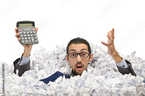 Foto: Man with lots of waste paper Man with lots of waste paper