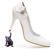Woman domination concept with shoes and man