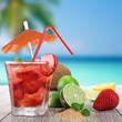 Fresh fruit cocktail on a beach