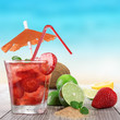 Fresh fruit cocktail on a beach Fresh fruit cocktail on a beach